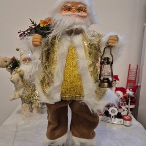 Božična dekoracija: zabavni dedek mraz, ki poplesuje ob praznični skladbi. Shiny-outlet.si vas popelje v veseli december.